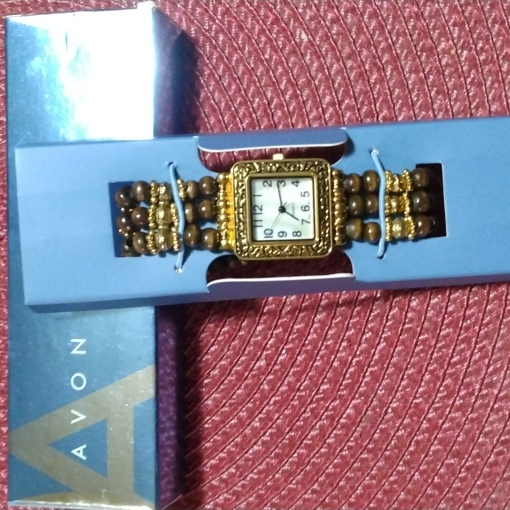 Watch, women, Avon, Wood Bead Stretch with Gold tone,new in box never used.
